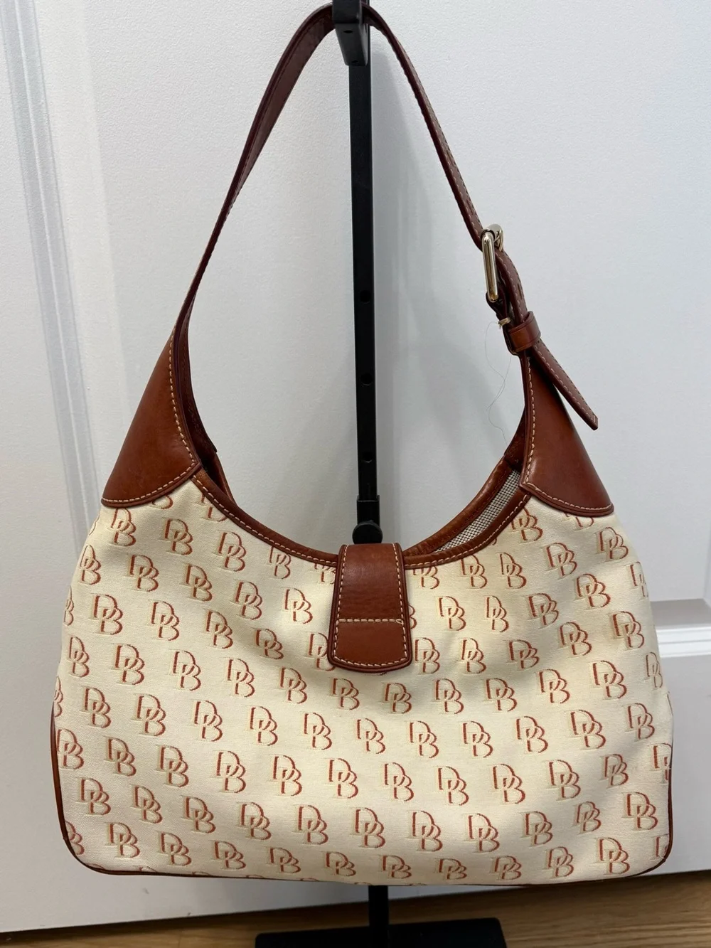 Dooney & Bourke Cream/Brown Signature Logo Lock Canvas Hobo Shoulder Bag